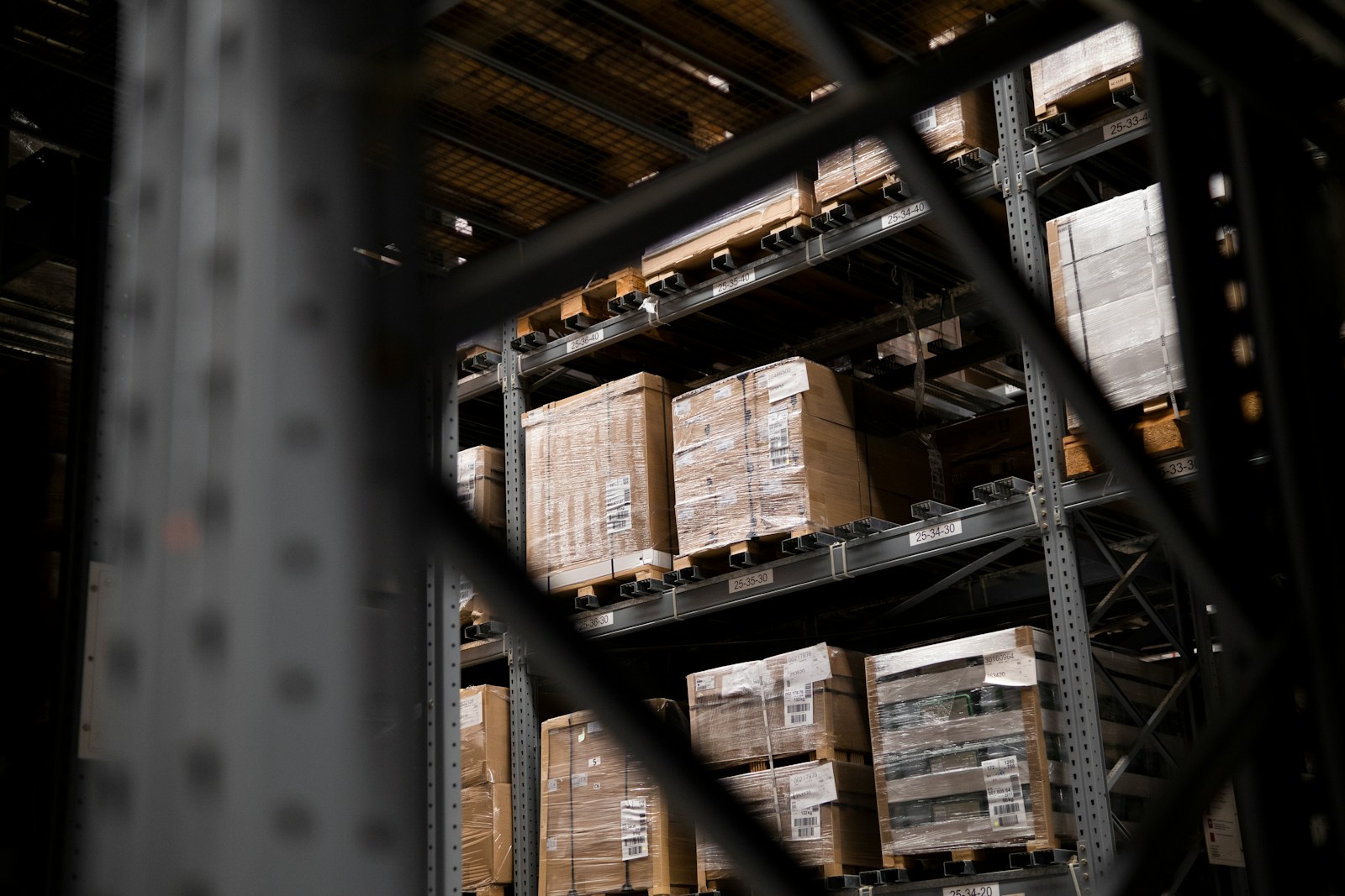 Palletised cartons on racking at a supplier facility